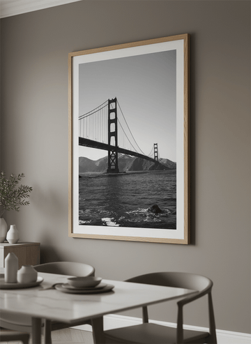 Wall art styled above a dining table in a contemporary home