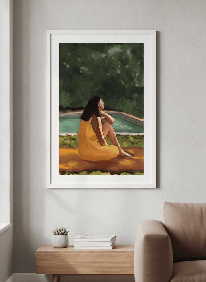 Modern wall art styled above a sofa in a neutral living room