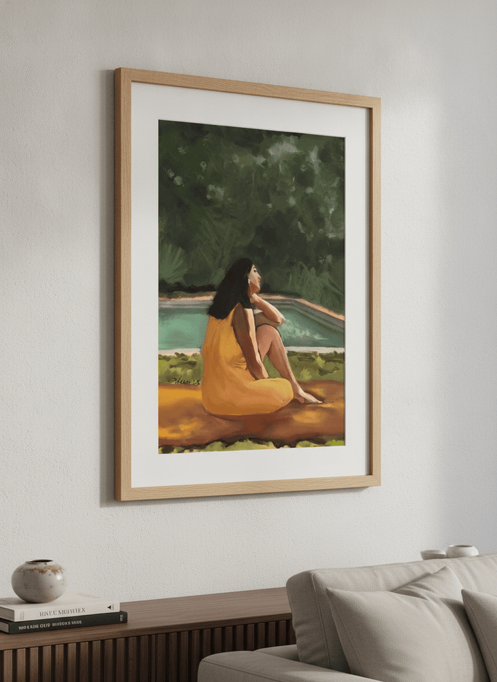 Modern wall art styled above a sofa in a neutral living room