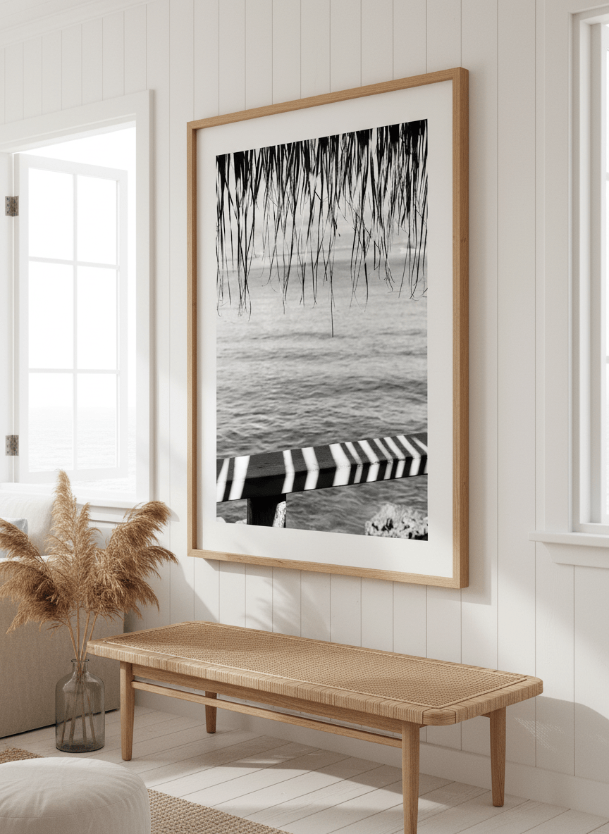 Neutral wall art displayed in a sunny coastal beach house