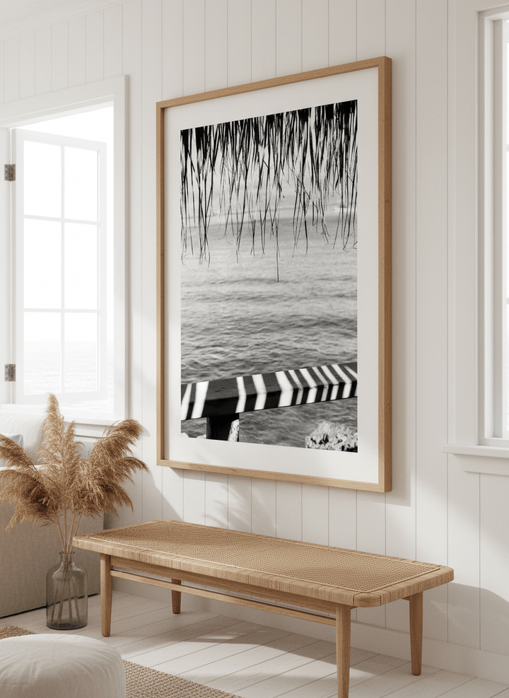 Neutral wall art displayed in a sunny coastal beach house
