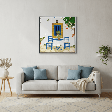 Canvas wall art with a silver leaf surround styled in a neutral living room