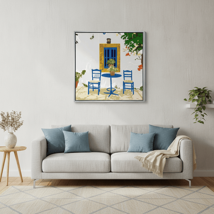 Canvas wall art with a silver leaf surround styled in a neutral living room