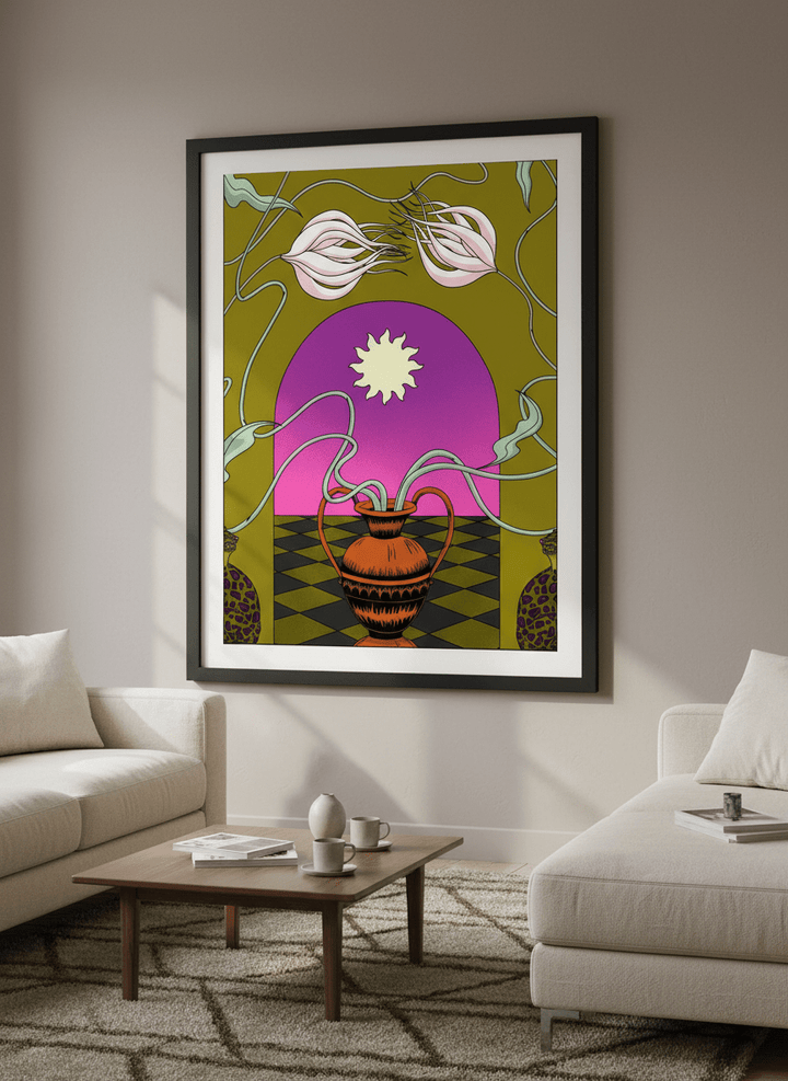 Modern wall art styled above a sofa in a neutral living room