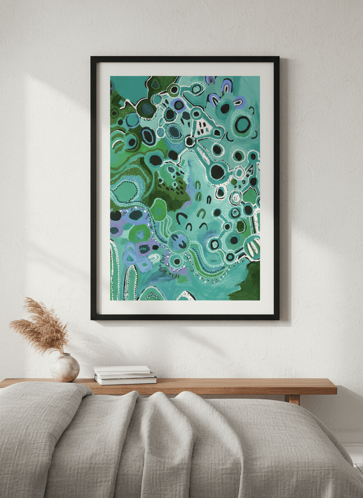 Minimalist artwork displayed in a calm, light-filled bedroom interior