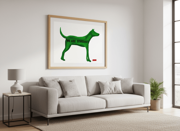 Modern wall art styled above a sofa in a neutral living room