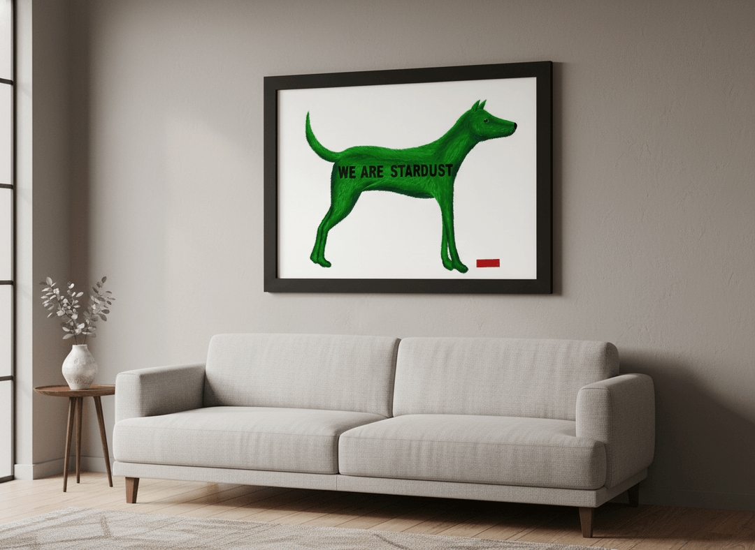Modern wall art styled above a sofa in a neutral living room