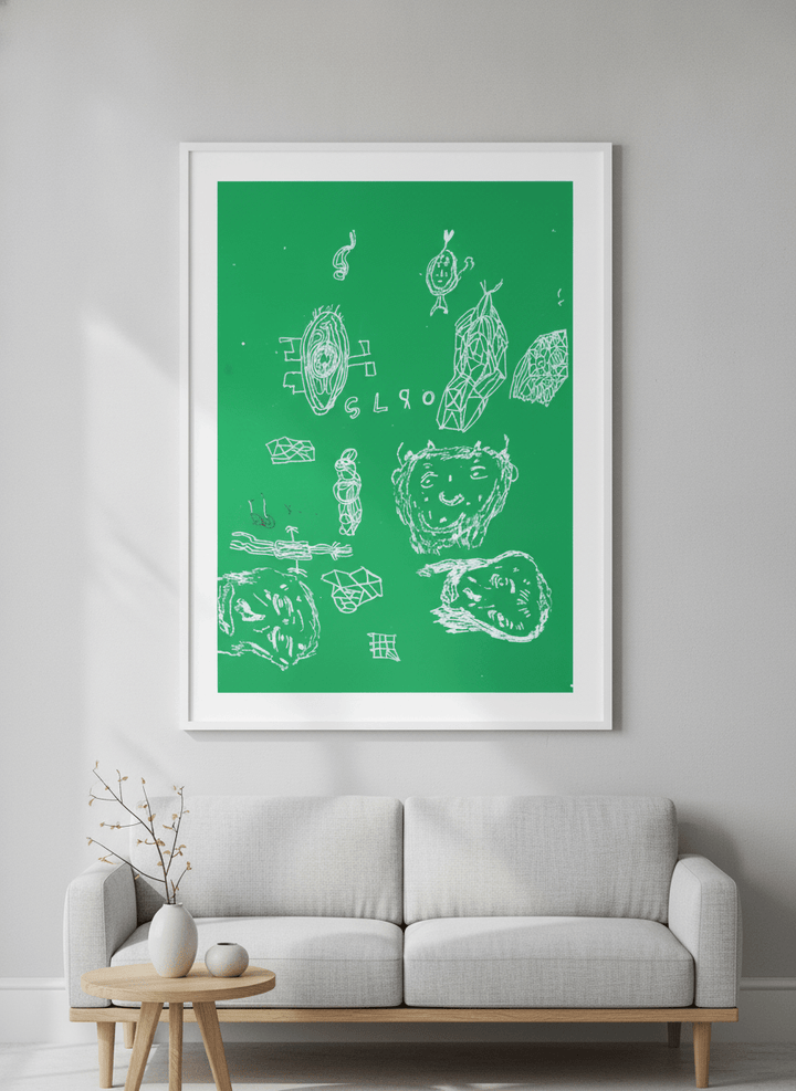Modern wall art styled above a sofa in a neutral living room