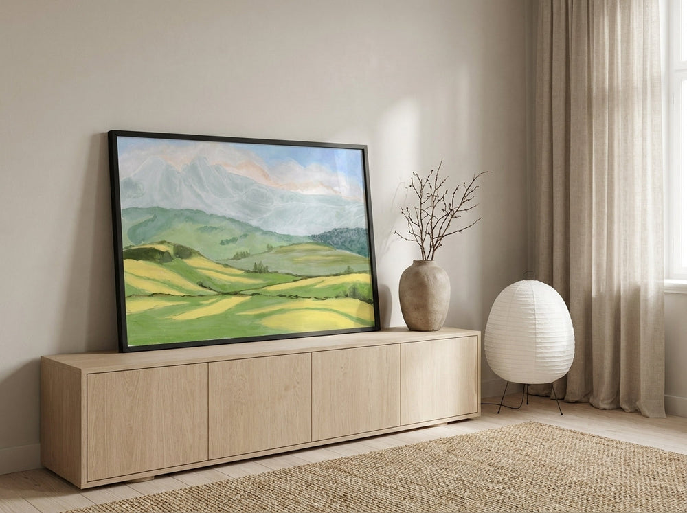 Modern wall art print standing on a sideboard in a warm Japandi bedroom