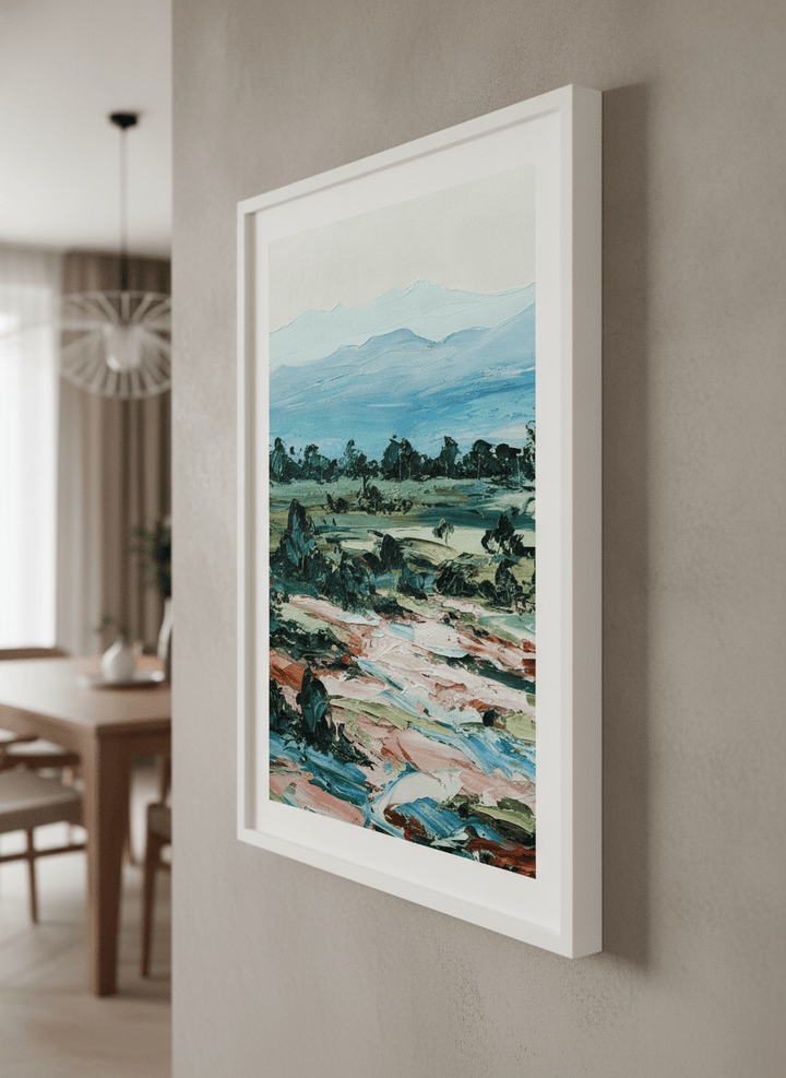 Wall art styled above a dining table in a contemporary home