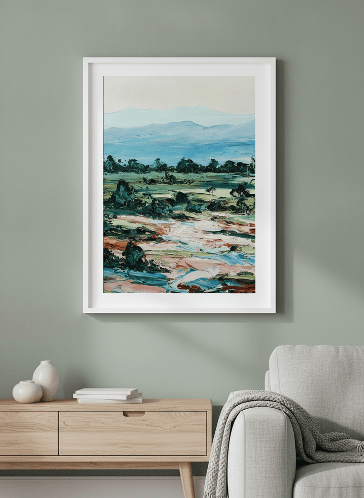 Modern wall art styled above a sofa in a neutral living room
