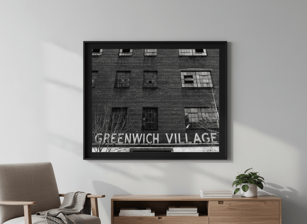 Modern wall art styled above a sofa in a neutral living room