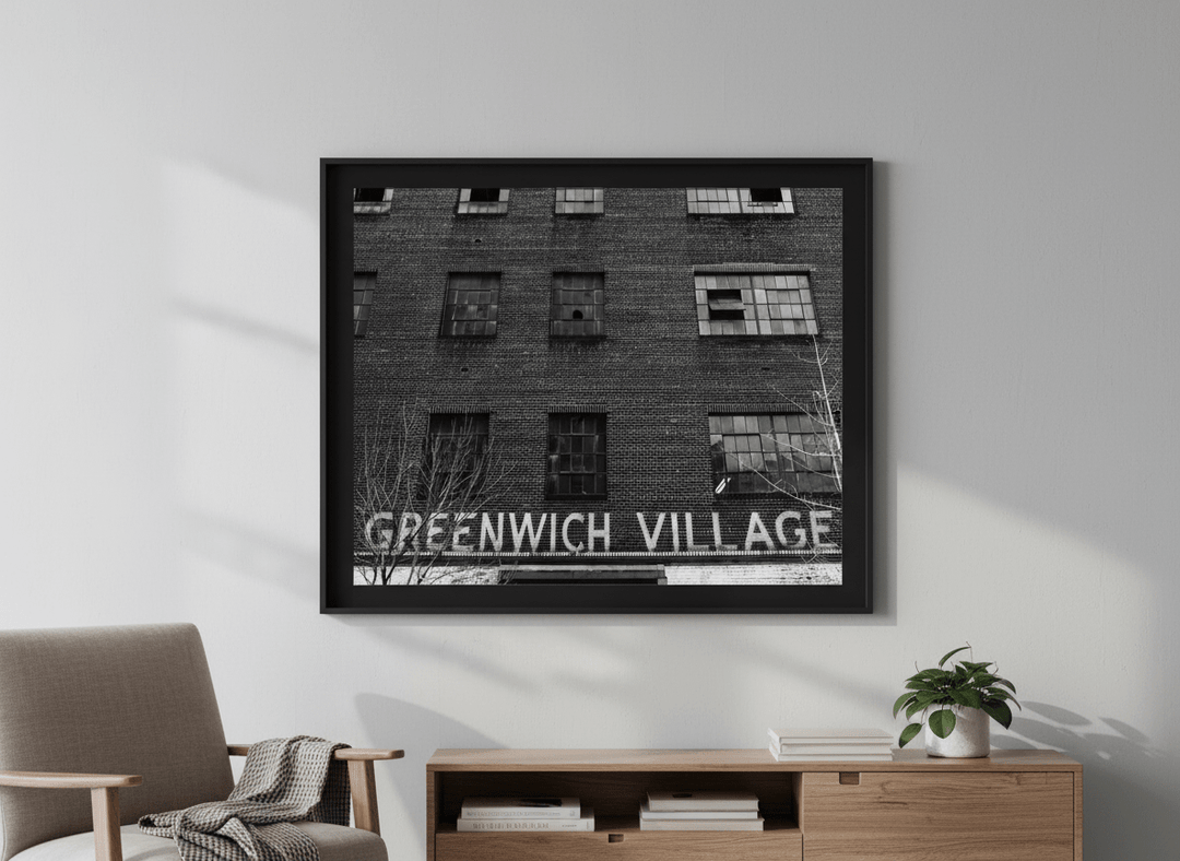 Modern wall art styled above a sofa in a neutral living room
