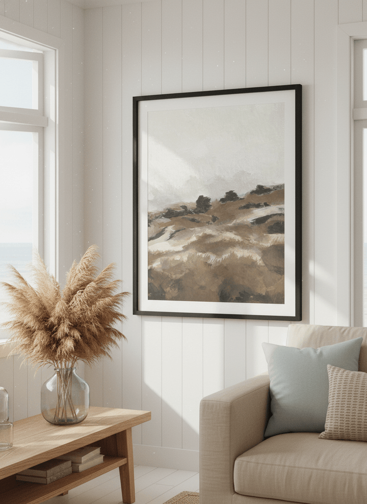 Neutral wall art displayed in a sunny coastal beach house