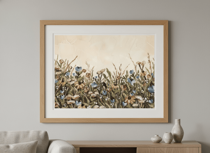 Modern wall art styled above a sofa in a neutral living room