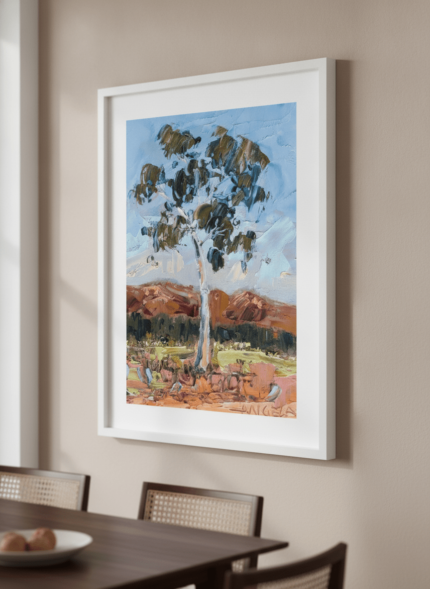 Wall art styled above a dining table in a contemporary home