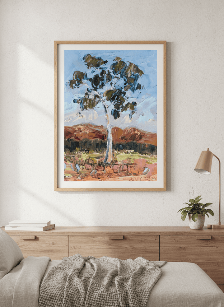 Minimalist artwork displayed in a calm, light-filled bedroom interior
