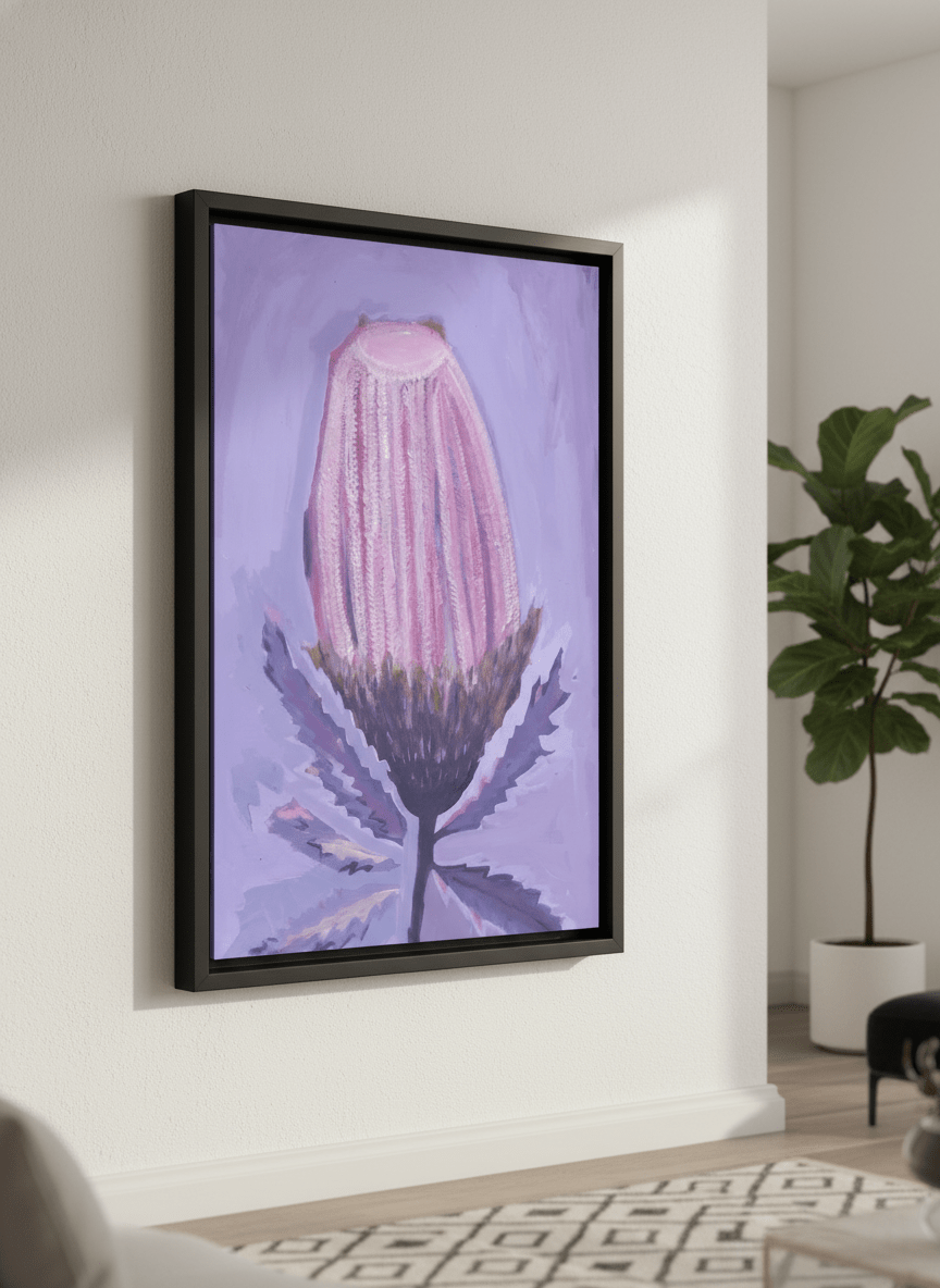 Modern wall art styled above a sofa in a neutral living room