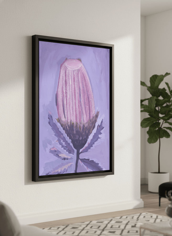 Modern wall art styled above a sofa in a neutral living room
