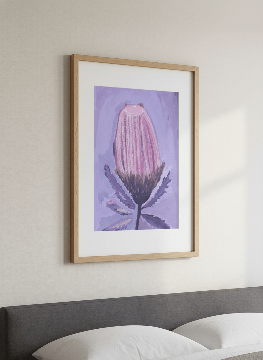 Minimalist artwork displayed in a calm, light-filled bedroom interior