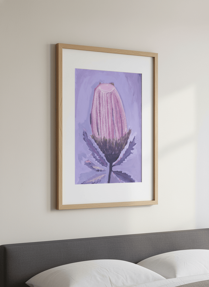 Minimalist artwork displayed in a calm, light-filled bedroom interior