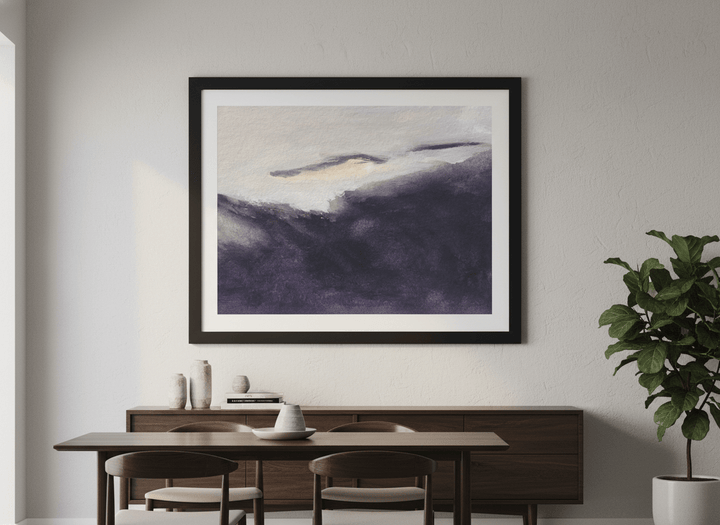 Wall art styled above a dining table in a contemporary home