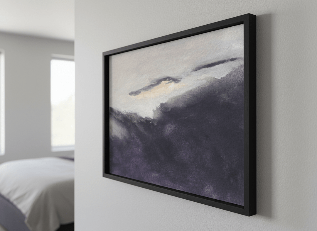 Minimalist artwork displayed in a calm, light-filled bedroom interior
