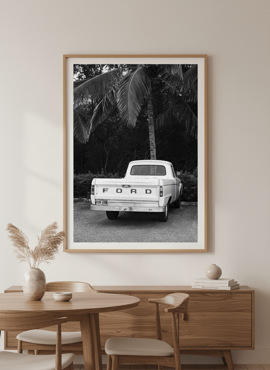 Wall art styled above a dining table in a contemporary home
