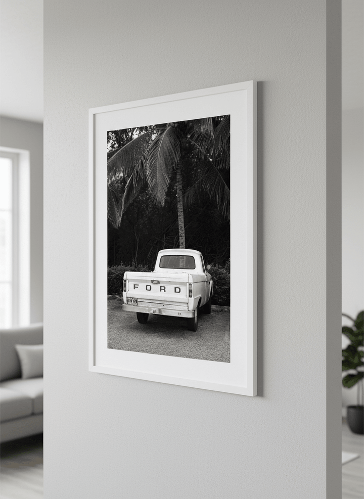 Modern wall art styled above a sofa in a neutral living room