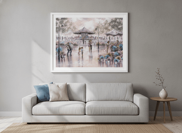 Modern wall art styled above a sofa in a neutral living room