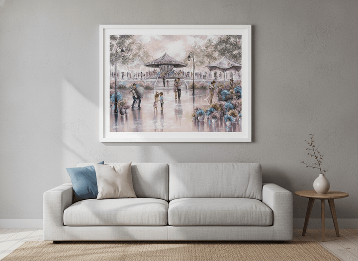 Modern wall art styled above a sofa in a neutral living room