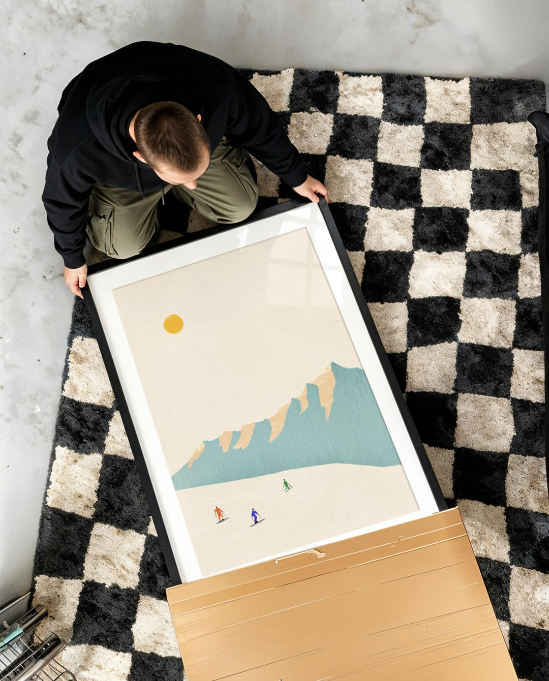 unboxing of artwork on checkered rug