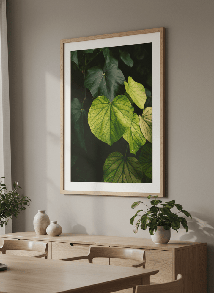 Wall art styled above a dining table in a contemporary home
