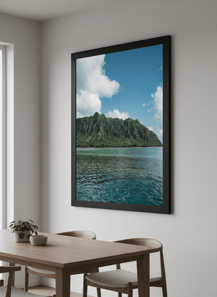Wall art styled above a dining table in a contemporary home
