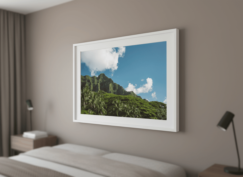 Minimalist artwork displayed in a calm, light-filled bedroom interior