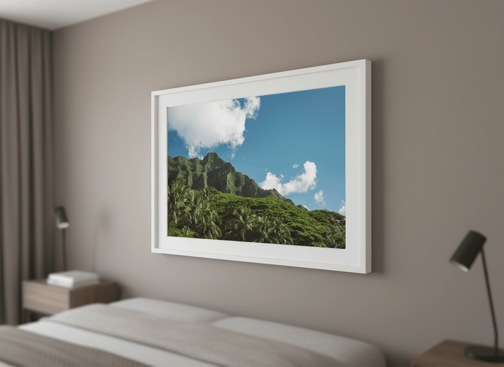 Minimalist artwork displayed in a calm, light-filled bedroom interior