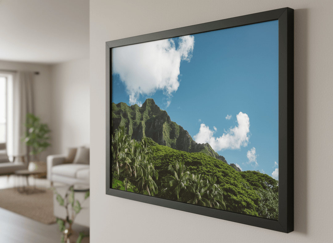 Modern wall art styled above a sofa in a neutral living room