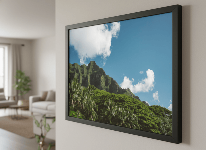 Modern wall art styled above a sofa in a neutral living room