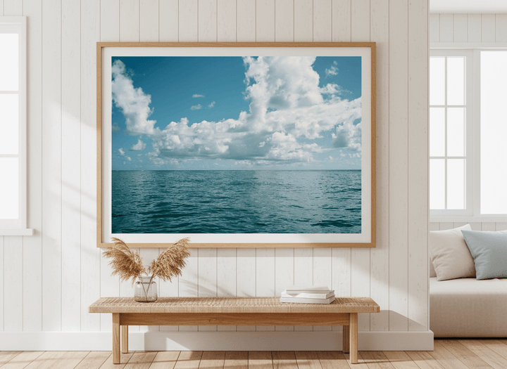 Neutral wall art displayed in a sunny coastal beach house