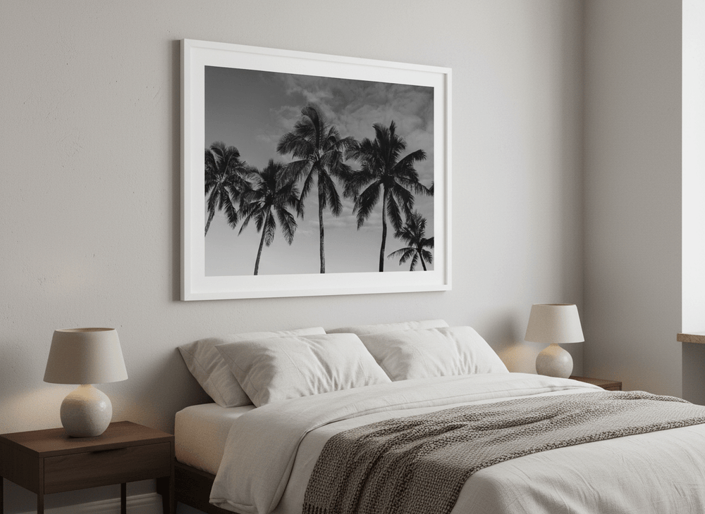 Minimalist artwork displayed in a calm, light-filled bedroom interior