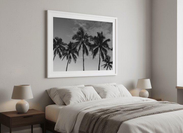 Minimalist artwork displayed in a calm, light-filled bedroom interior