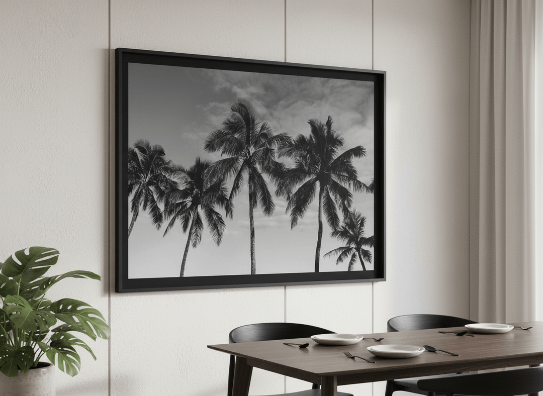 Wall art styled above a dining table in a contemporary home