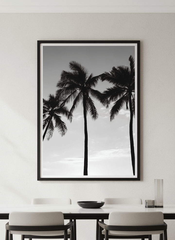Wall art styled above a dining table in a contemporary home