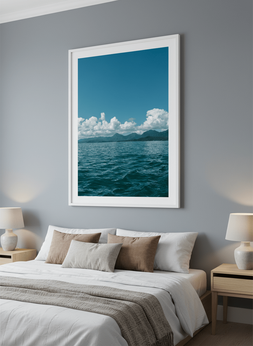 Minimalist artwork displayed in a calm, light-filled bedroom interior