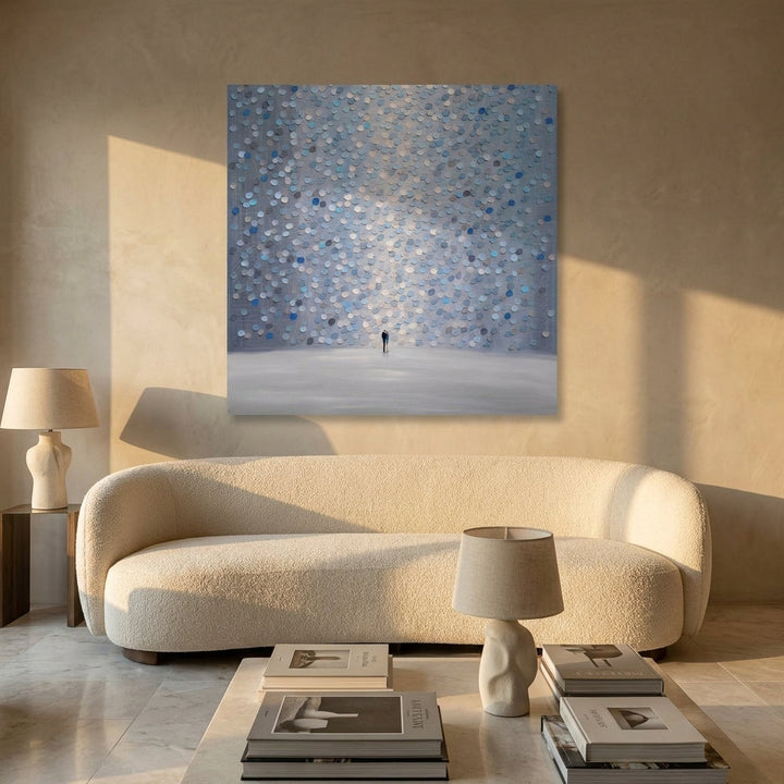 Stretched canvas wall art styled on the wall in a luxe living room