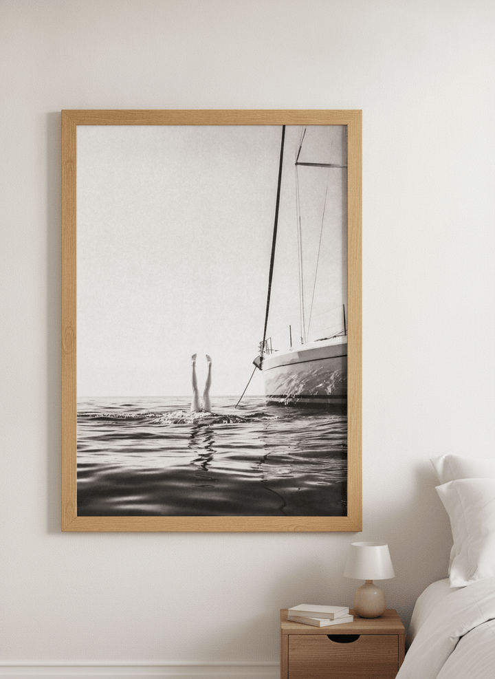 Minimalist artwork displayed in a calm, light-filled bedroom interior
