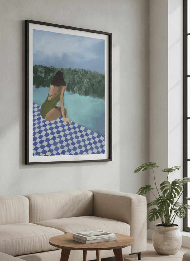 Modern wall art styled above a sofa in a neutral living room