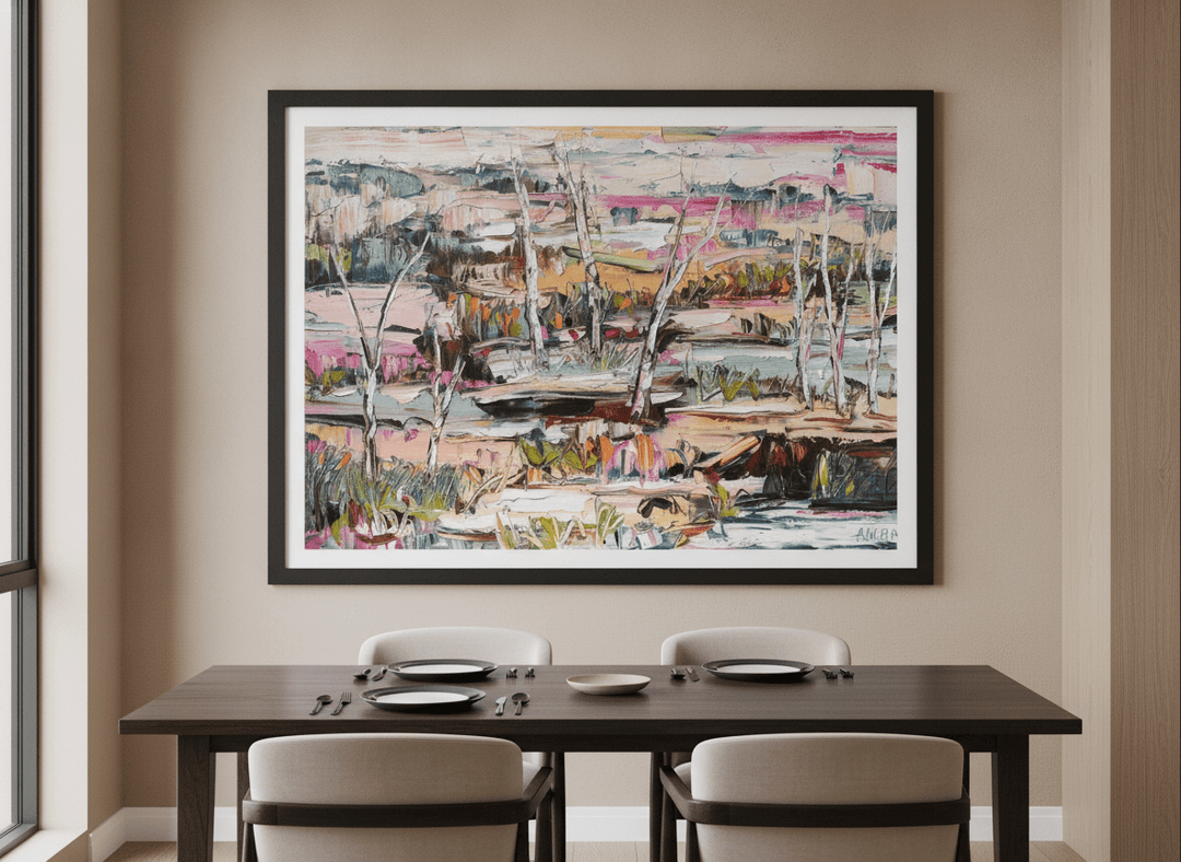Wall art styled above a dining table in a contemporary home