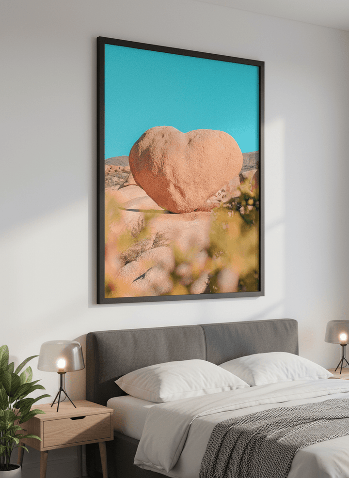 Minimalist artwork displayed in a calm, light-filled bedroom interior