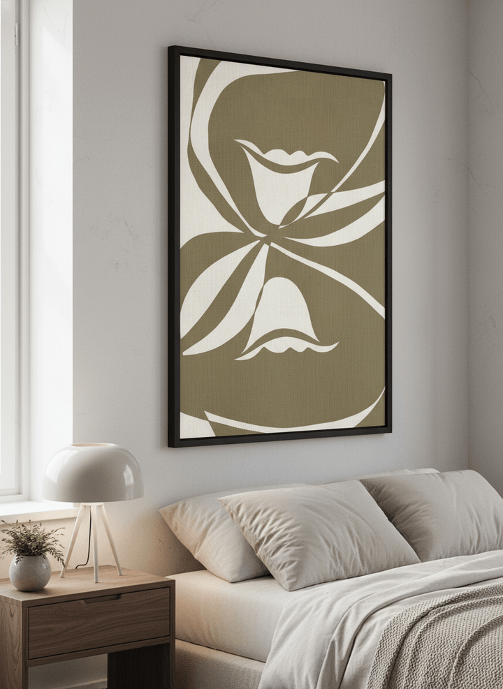 Minimalist artwork displayed in a calm, light-filled bedroom interior